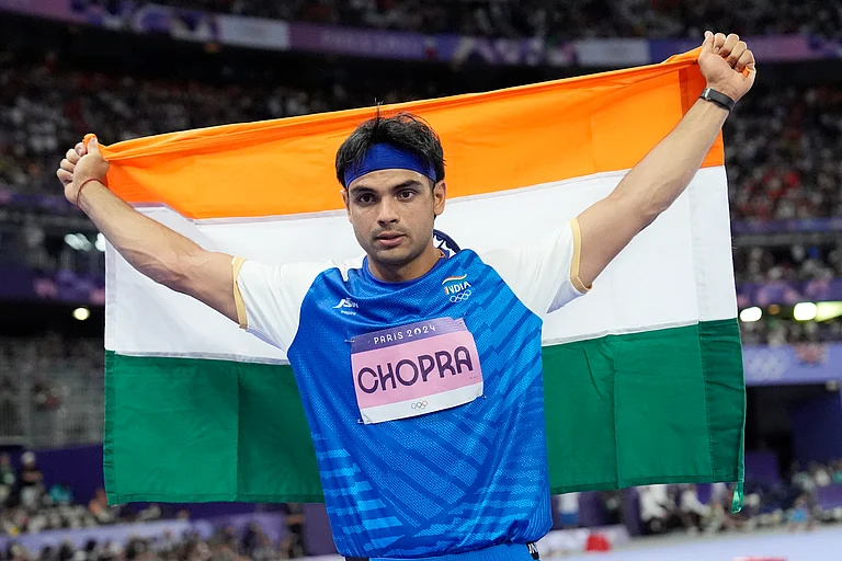 Silver medalist, Neeraj Chopra, of India, celebrates after the men's javelin throw final at the 2024 Summer Olympics, Thursday, Aug. 8, 2024, in Saint-Denis, France.
- (AP Photo/Matthias Schrader)